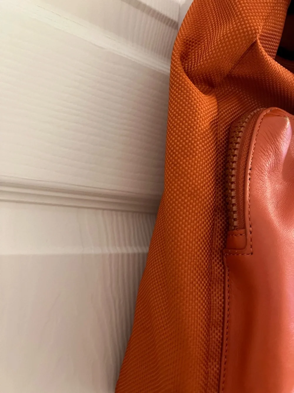 Coach Men's Orange Leather Sling one shoulder Backpack
